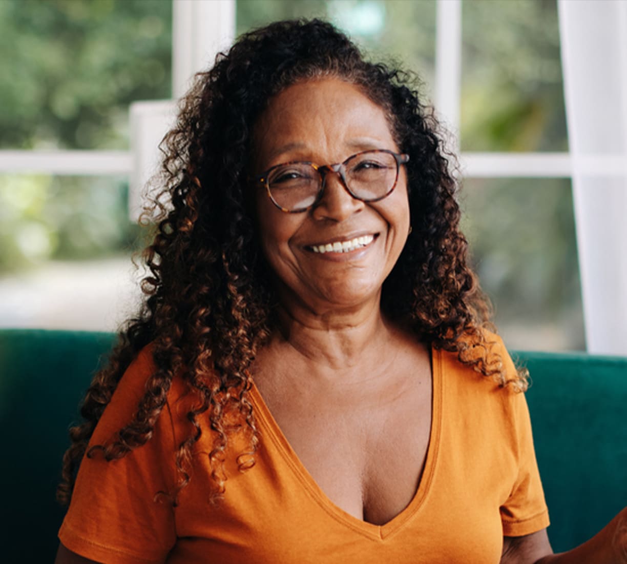 a woman smiling for the camera