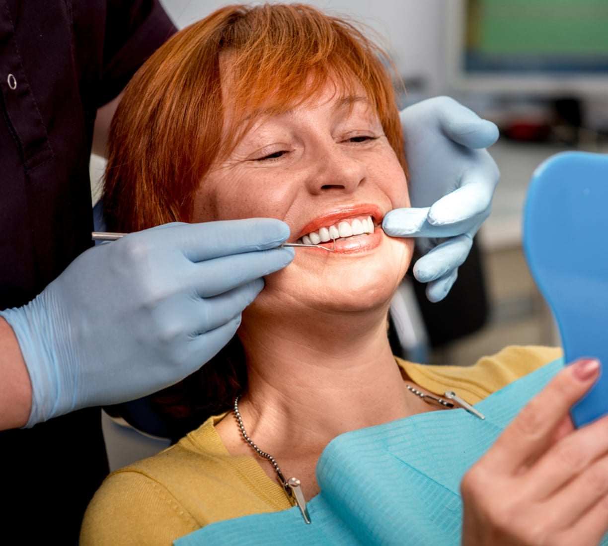 a woman brushing her teeth