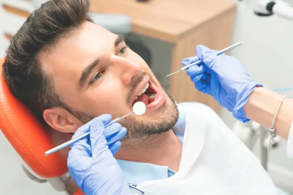 Man having dental exams near brownstown