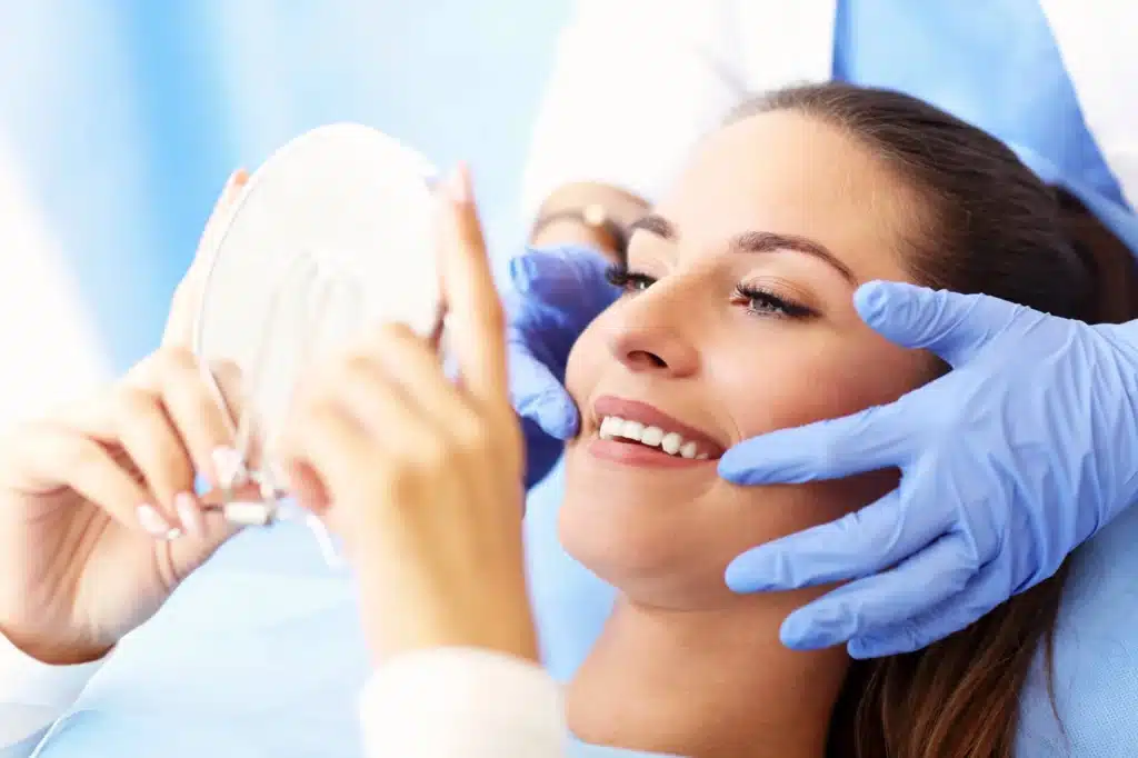 Woman-smiling-after-root-canal-brownstown-mi