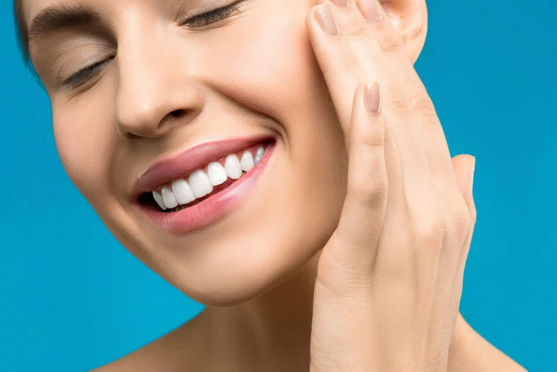 Girl with white teeth by brownstown cosmetic dentist
